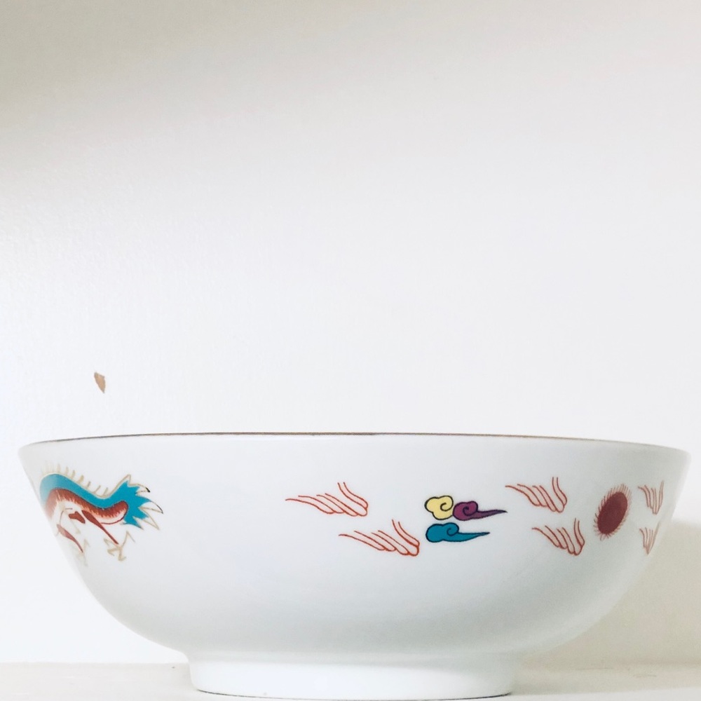 Vintage dragon serving bowl with gold edging